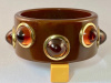 BB162 chocolate bakelite bangle with lucite cabochon dots